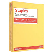 Box of Staples pastel copy paper with yellow and red design